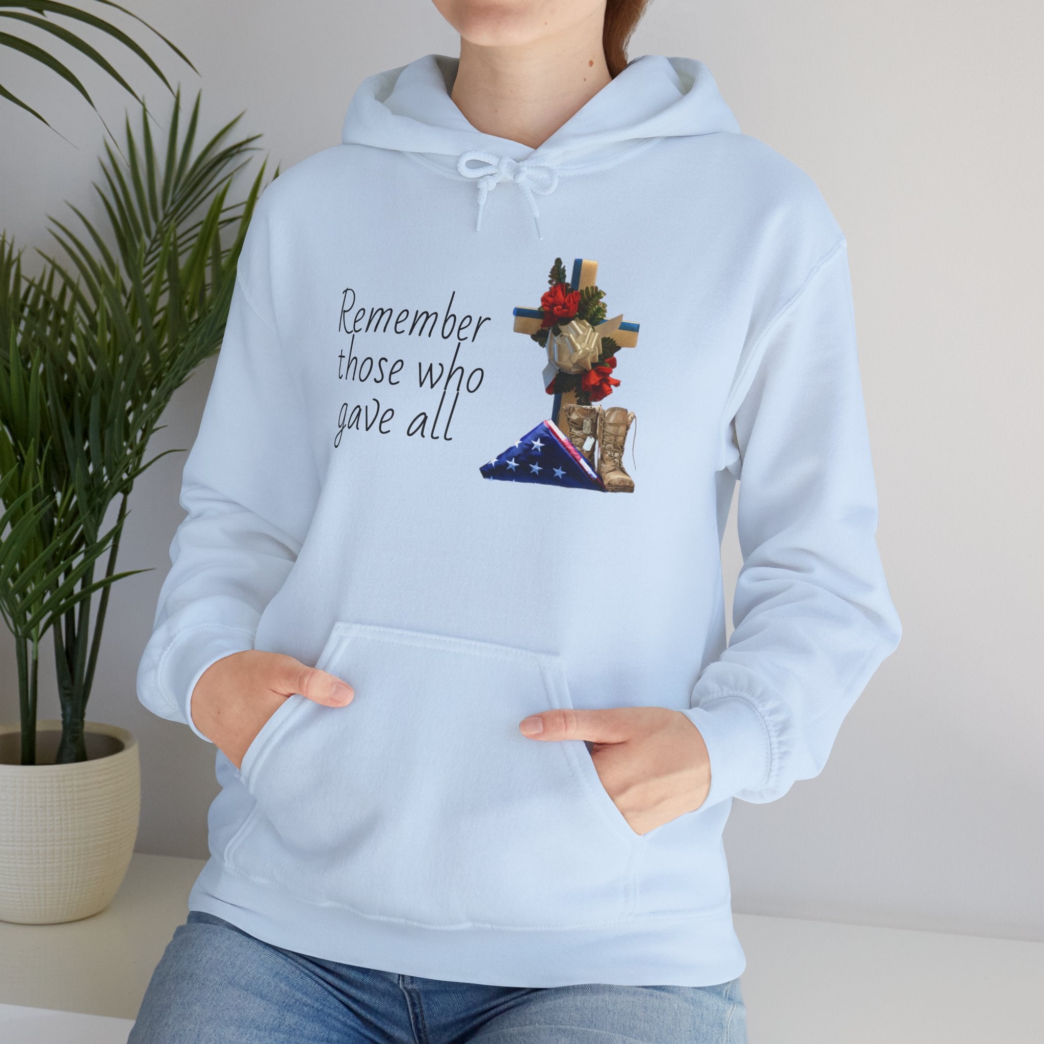 Patriotic Fallen Soldier Hoodie — Folded Flag, Combat Boots & Cross with Red Roses